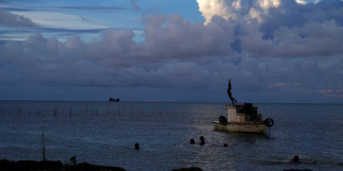 Dramatic footage of tsunami hitting the Pacific island of Tonga after a giant underwater volcano erupted