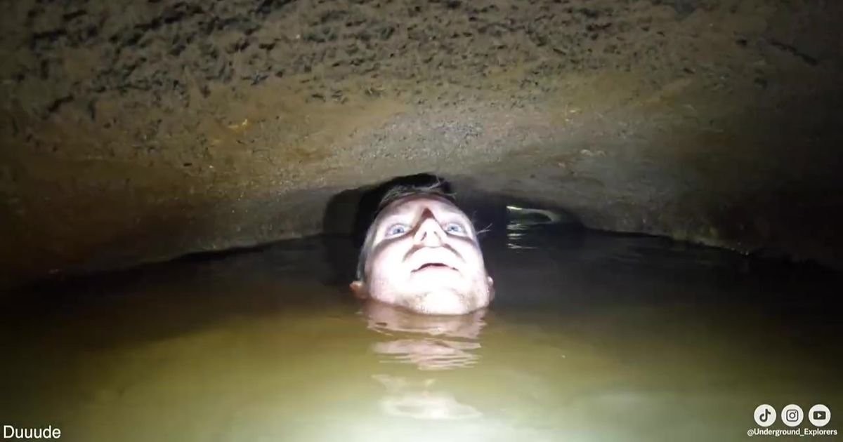 Cave diver nearly drowns squeezing through submerged tunnel in terrifying clip
