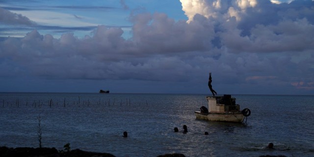 Dramatic footage of tsunami hitting the Pacific island of Tonga after a giant underwater volcano erupted